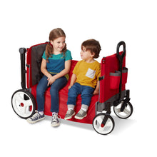 Load image into Gallery viewer, Radio Flyer Convertible Stroll N Wagon with 5 Point Harnesses, Rear Brake, Front Caster Wheels, 12 Inch Rear Wheels, and Push Pull Handle, Red
